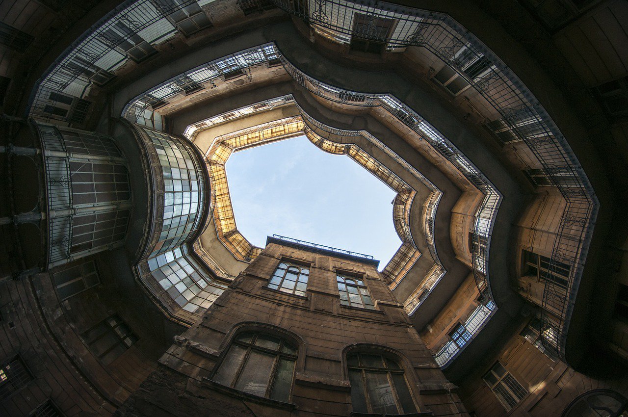 Forgotten Grandeur: A Fisheye View into an Abandoned Light-Well