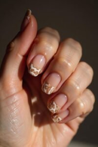 brown french tip nail design