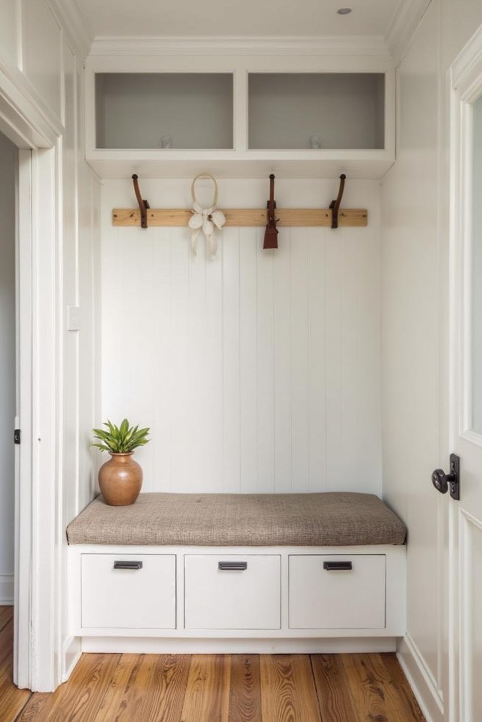 Modern Minimalist Mudroom with Built-in Seating