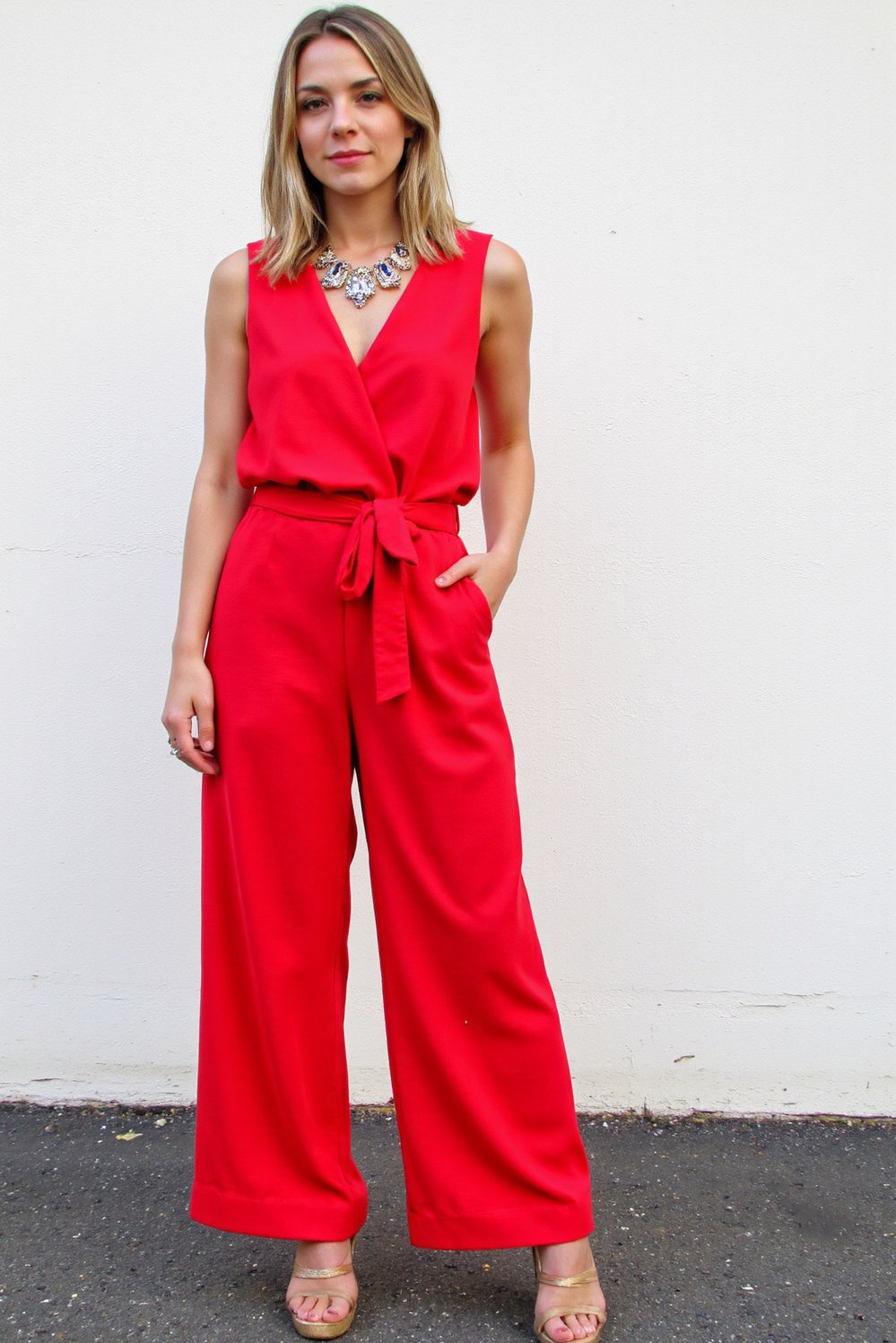 graduation outfit ideas - Vibrant Red Jumpsuit: Graduation Outfit Ideas - Red jumpsuit graduation outfit: This vibrant red wide-leg...
