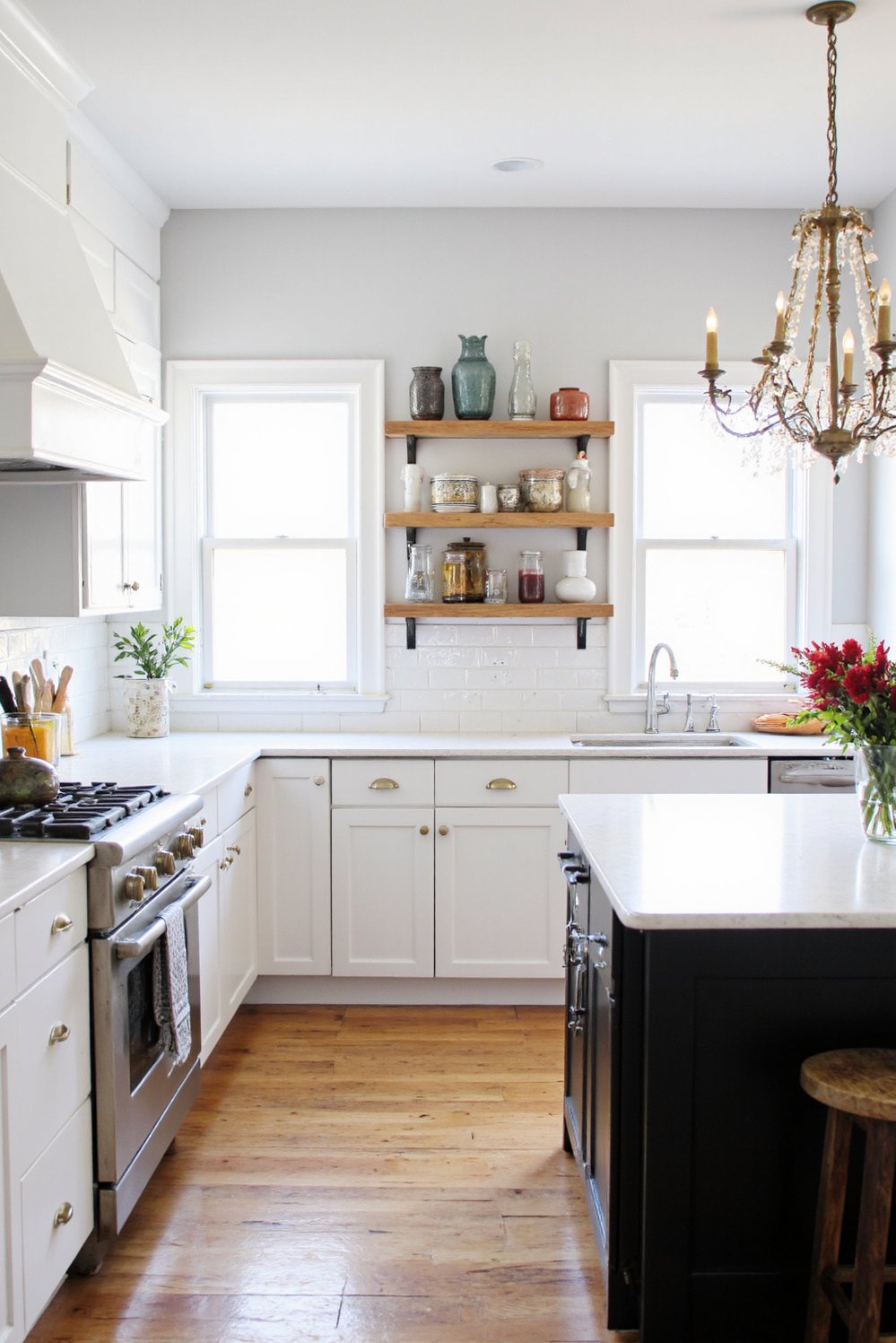 Black and White Modern Kitchen - Bright White Kitchen Design with Black Island - Bright white kitchen with a black island: airy...