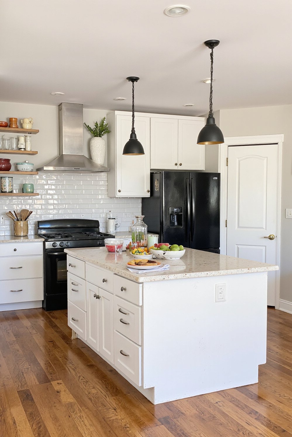 Black and White Modern Kitchen - White Kitchen With Black Appliances: Modern Design - Modern black and white kitchen design. I love...