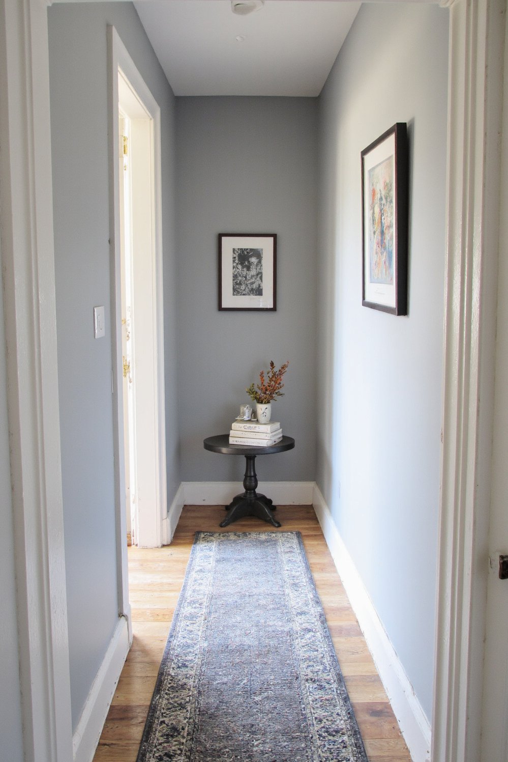Narrow hallway decor ideas - Sophisticated Grey: Decorating a Long Narrow Hallway - A sophisticated grey hallway? Yes, please! This monochromatic...