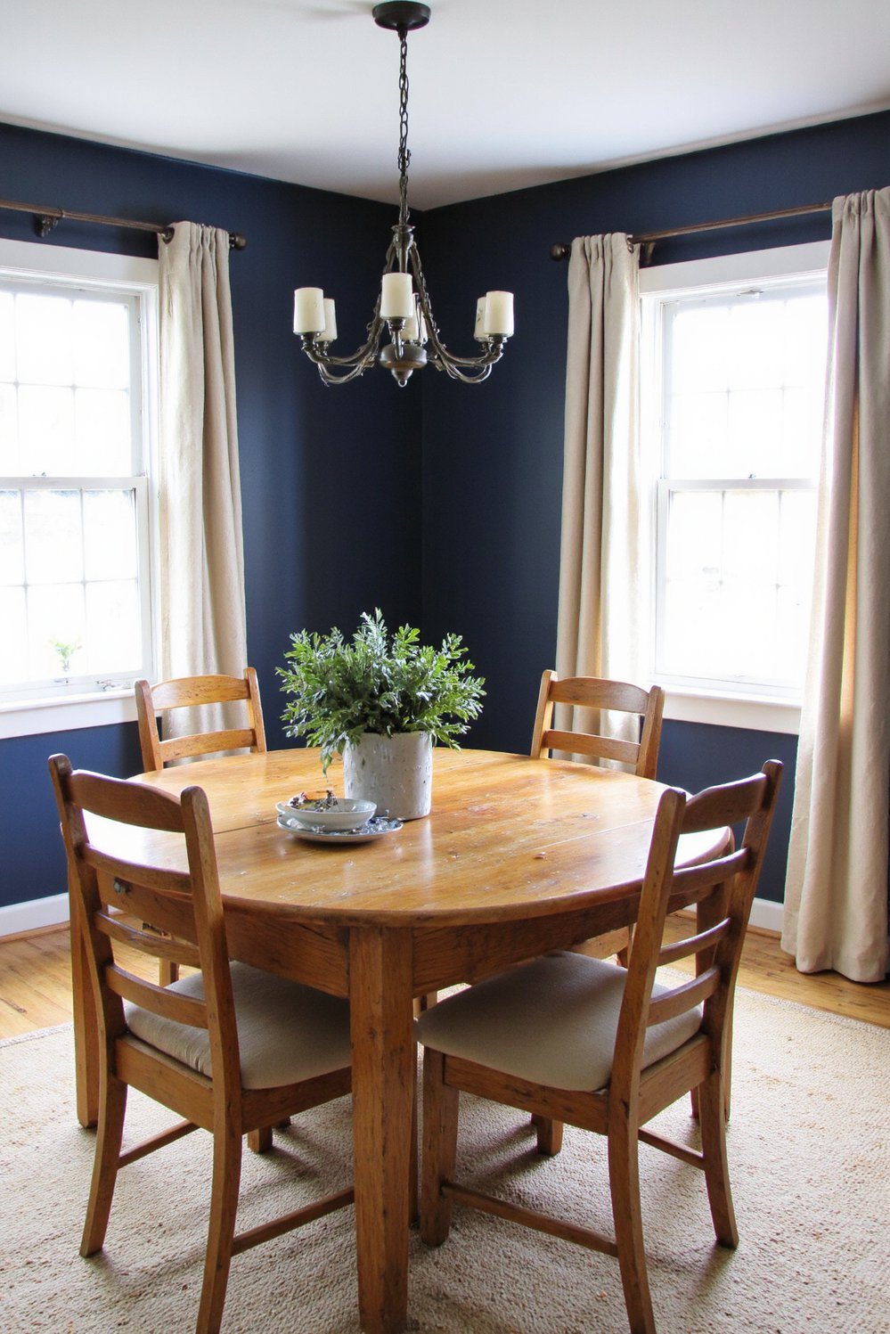 Modern Farmhouse Color Palette - Navy Walls & Oak: Modern Farmhouse Dining Room - Modern farmhouse dining room: Deep navy walls create...
