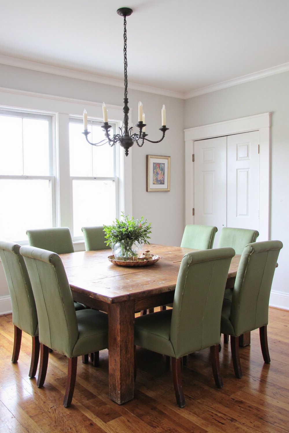 Neutral upholstered dining chairs - Neutral Dining Chairs: Muted Green & Reclaimed Wood - Five muted green dining chairs gathered around a...