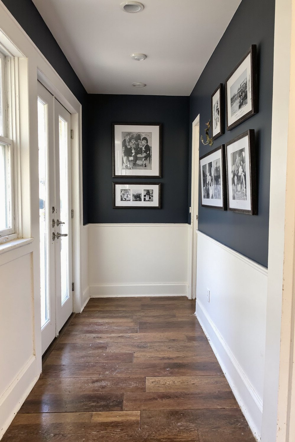 Modern Farmhouse Color Palette - Modern Farmhouse Hallway: Charcoal, White & Black - This hallway perfectly demonstrates a sophisticated modern farmhouse...