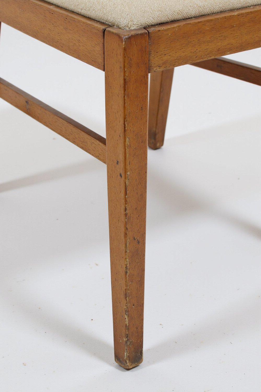 Neutral upholstered dining chairs - Beige Linen Dining Chairs: Simple Elegance & Craftsmanship - Close-up of a beige linen dining chair, showcasing...