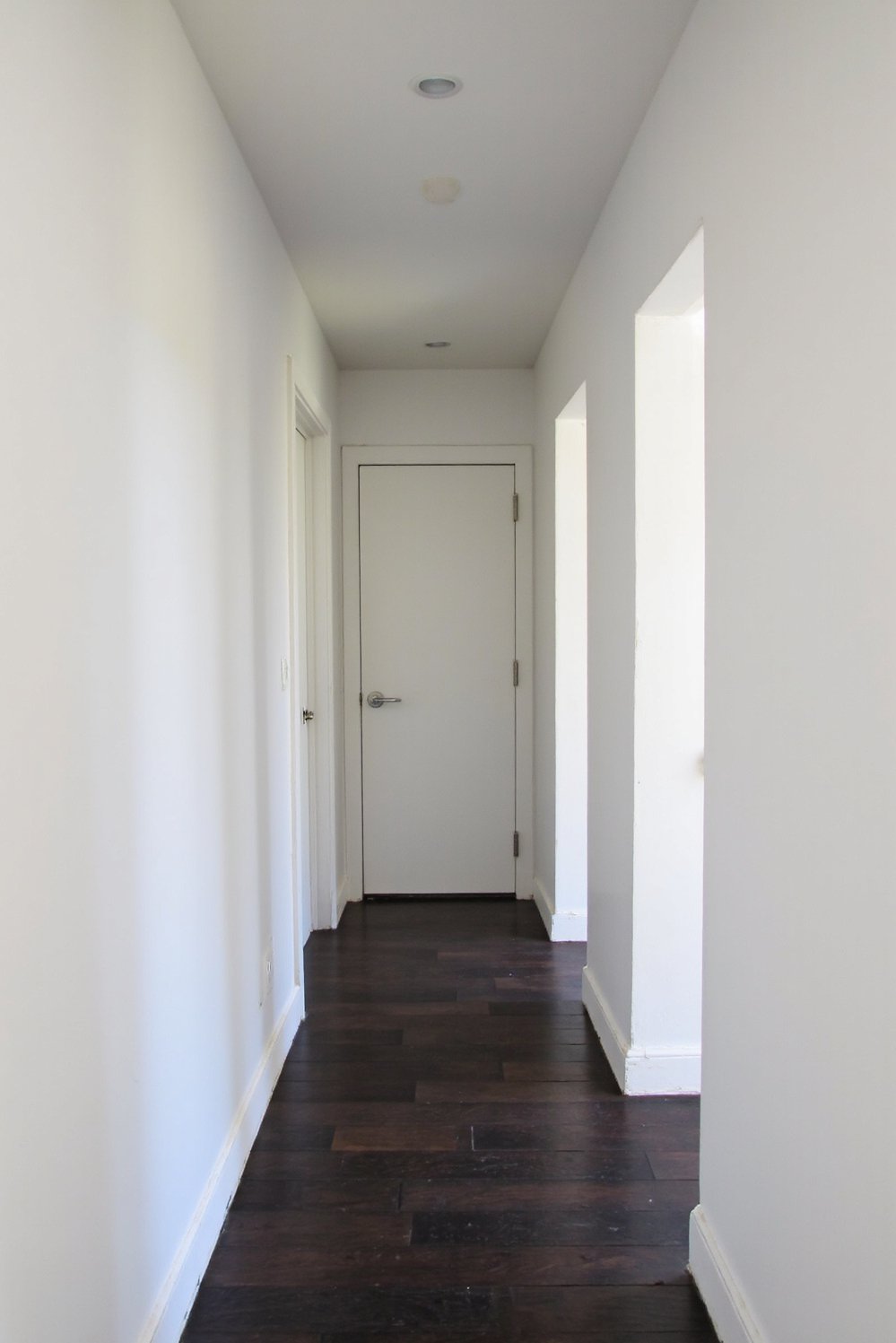 Narrow hallway decor ideas - Bright White Walls & Recessed Lighting: Modern Hallway - Love this bright and airy hallway solution! Glossy...