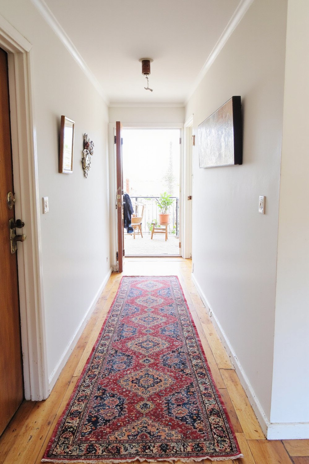 Narrow hallway decor ideas - Geometric Runner Rug: Decorating a Long Narrow Hallway - Liven up a long, narrow hallway with a...