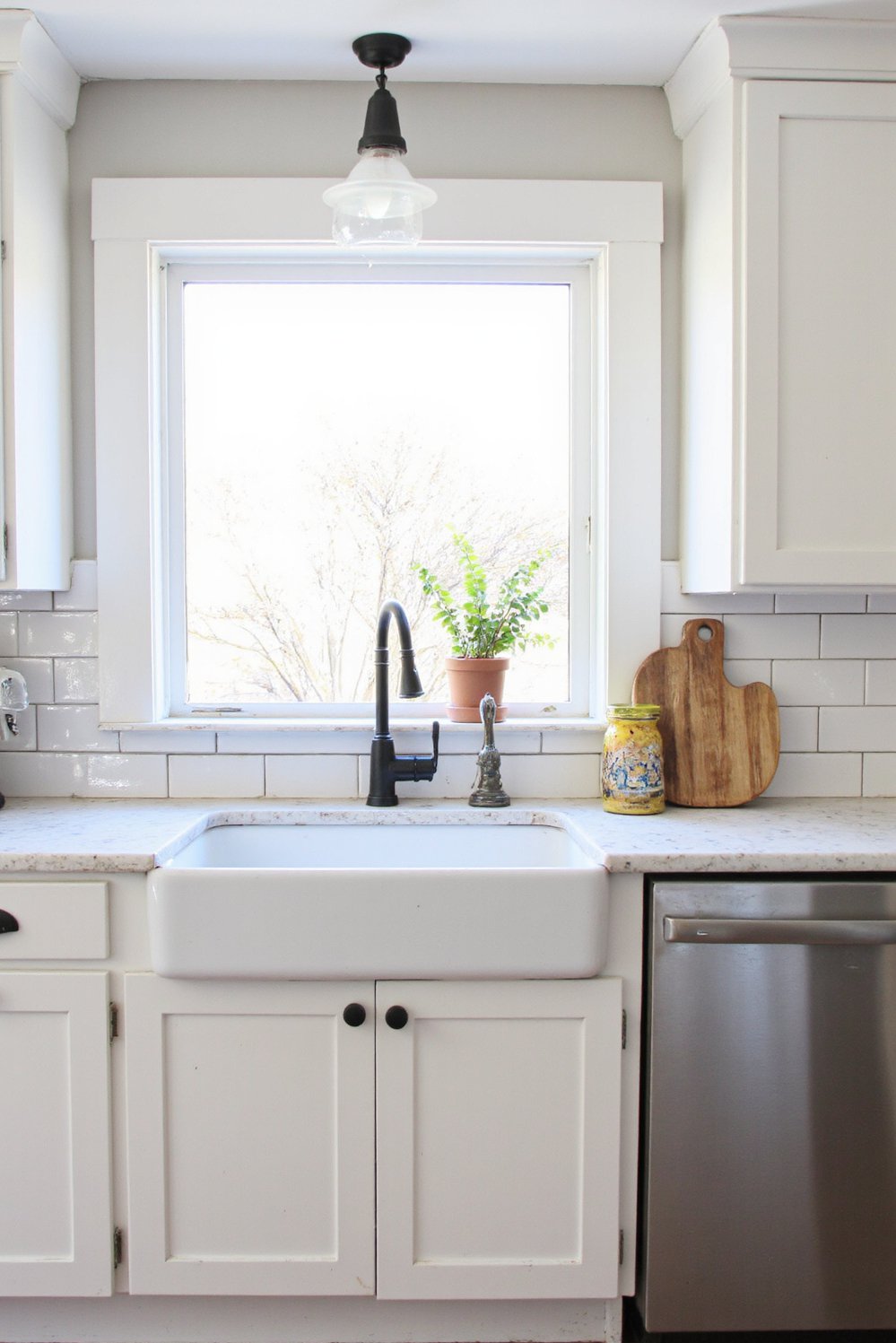 Black and White Modern Kitchen - Modern Farmhouse Kitchen: White Cabinets, Black Hardware - Modern farmhouse kitchen: white cabinets, black hardware, and...