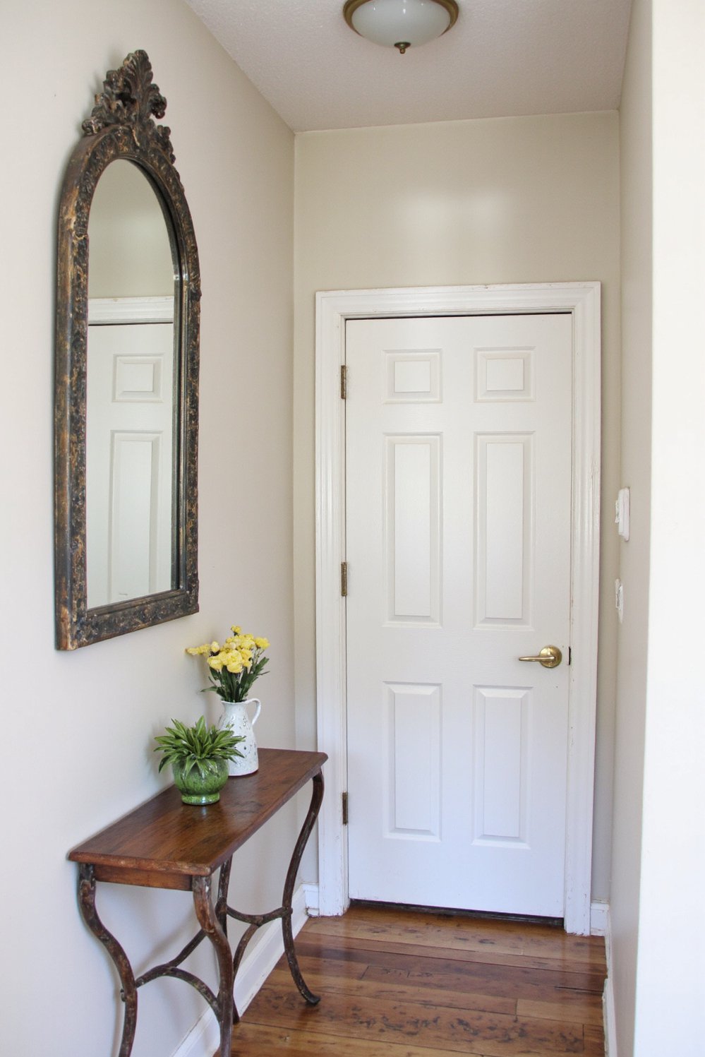 Narrow hallway decor ideas - Maximize Light: Mirror Decor for a Narrow Entryway - Make a small entryway feel huge with a...
