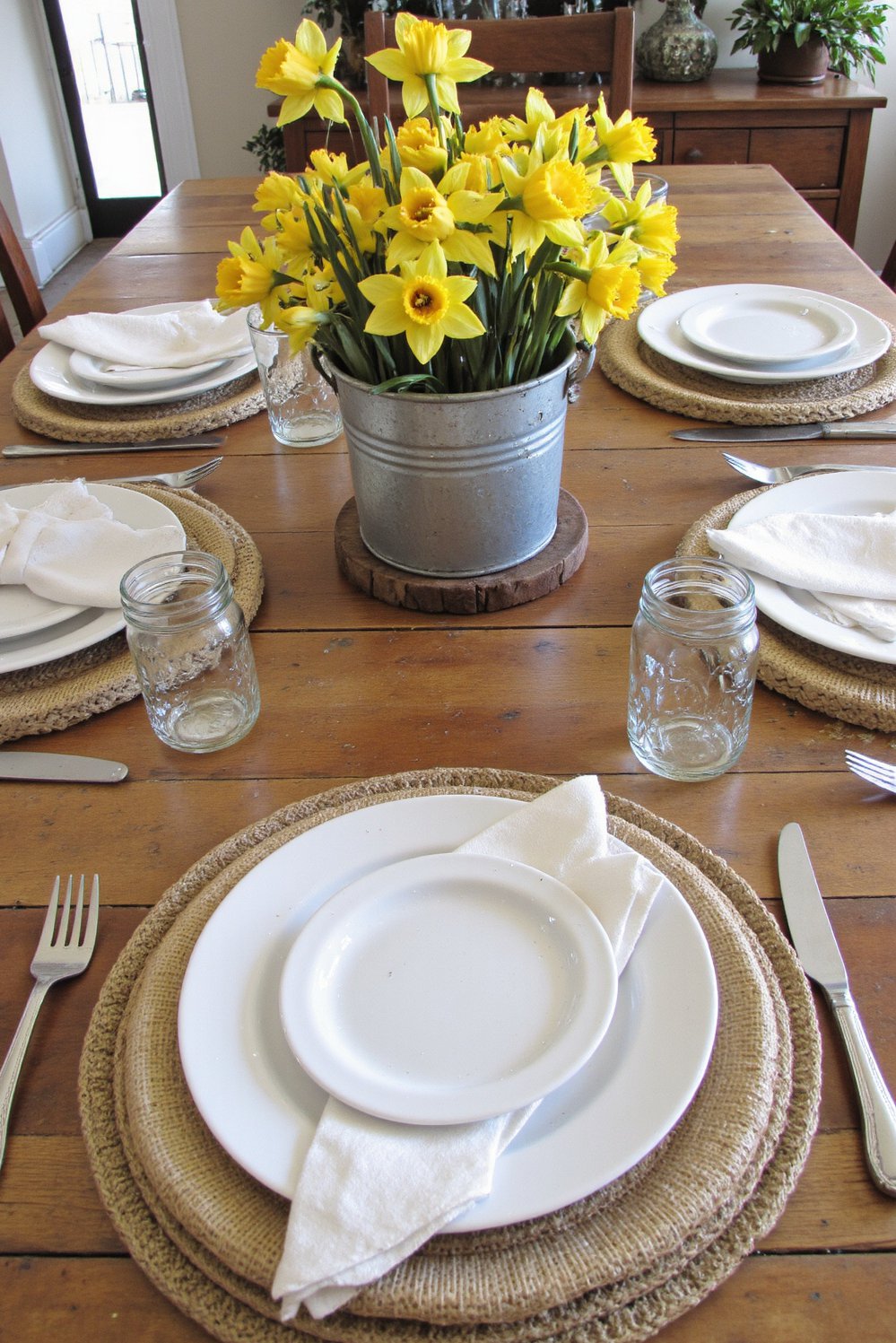 Spring Tablescapes ideas - Rustic Spring Tablescapes: Daffodils & Burlap Charm - Rustic spring tablescape ideas using weathered wood. I...