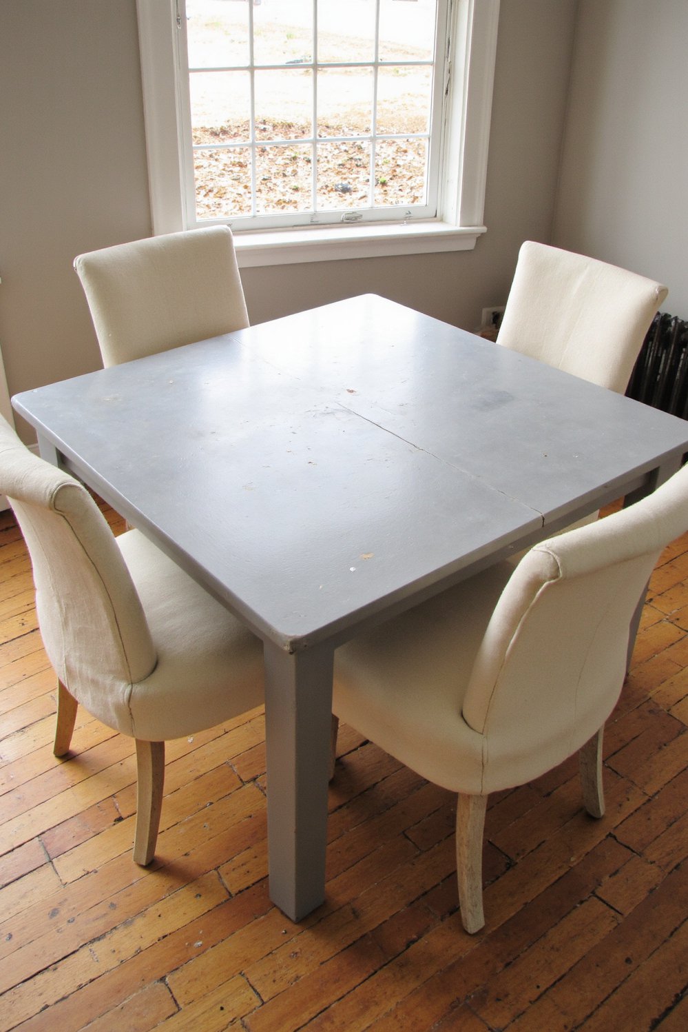 Neutral upholstered dining chairs - Creamy White Linen Dining Chairs: Modern & Antique Mix - Modern dining chairs: Four creamy-white linen chairs around...