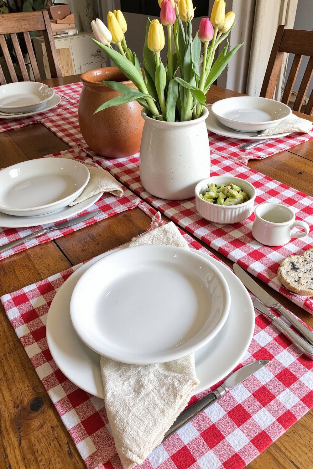 Spring Tablescapes ideas - Rustic Spring Tablescapes: Farmhouse Pottery & Tulips - Create a charming spring tablescape with rustic pottery...