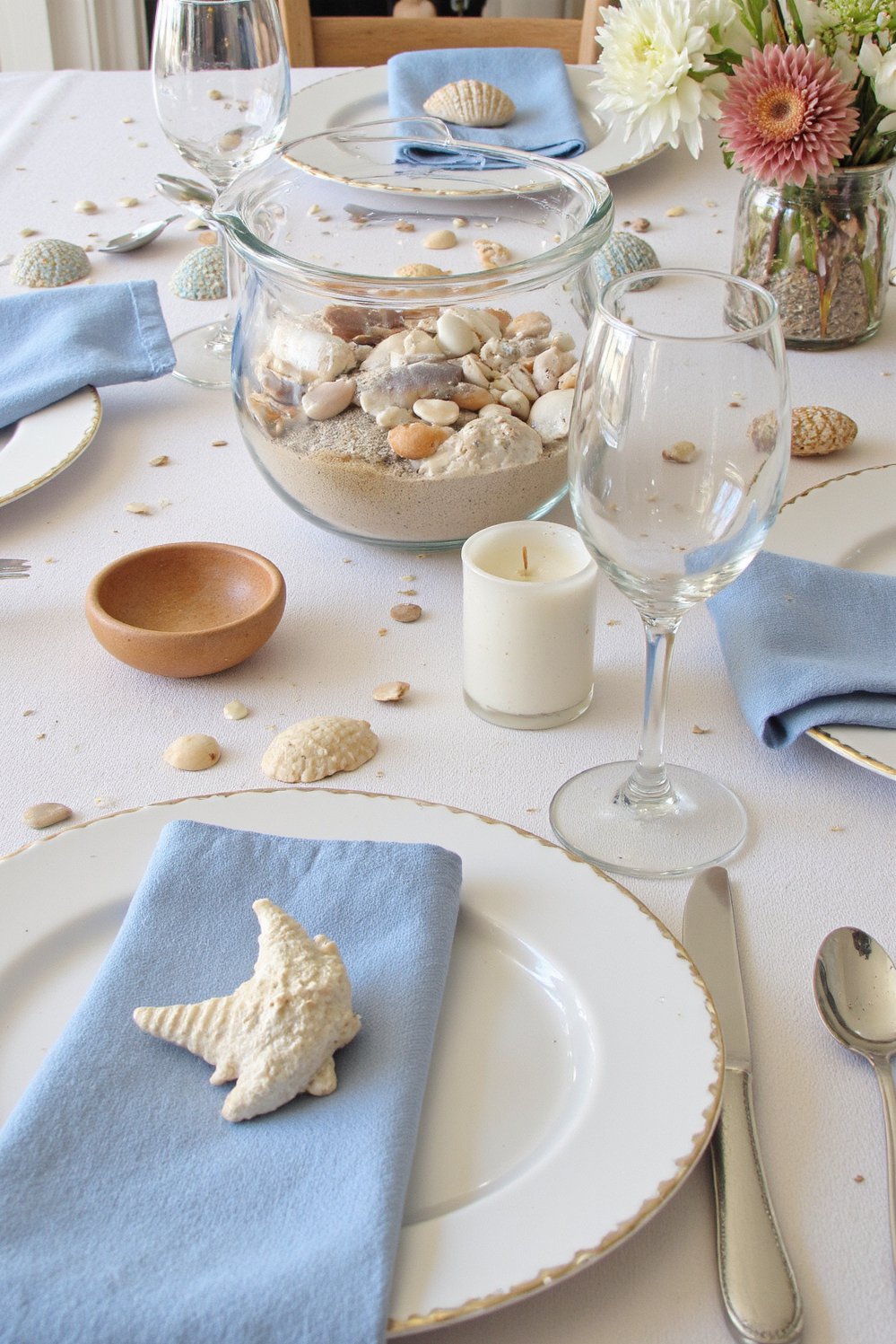 Spring Tablescapes ideas - Nautical Spring Tablescape: Seashells & Blue Hues - Create a spring tablescape with a nautical theme!...
