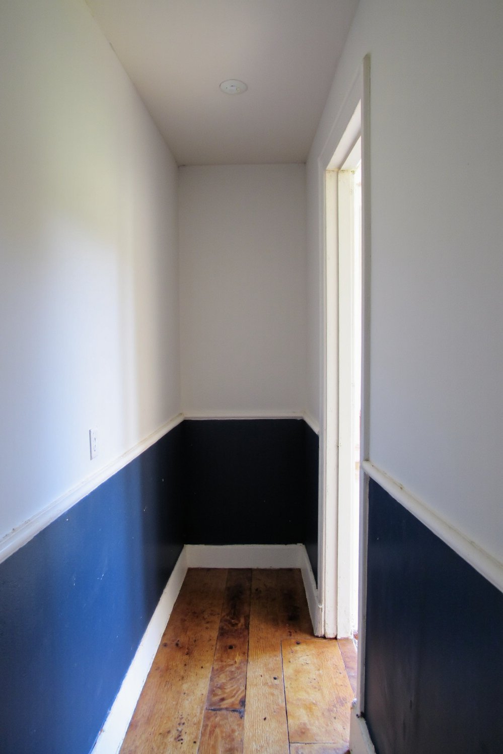 Narrow hallway decor ideas - Two-Tone Blue Hallway: Nautical Style Inspiration - Love this two-toned hallway! Deep navy blue on...