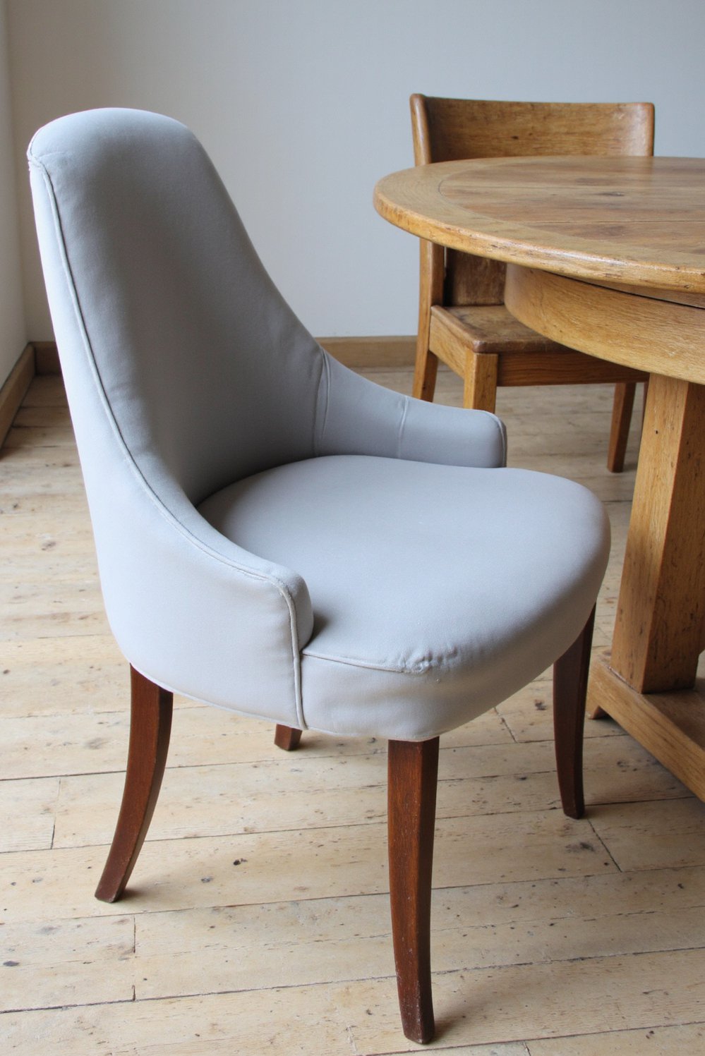 Neutral upholstered dining chairs - Luxurious Dove-Gray Dining Chair: Minimalist Style - Luxury dining chair: This dove-gray velvet chair is...