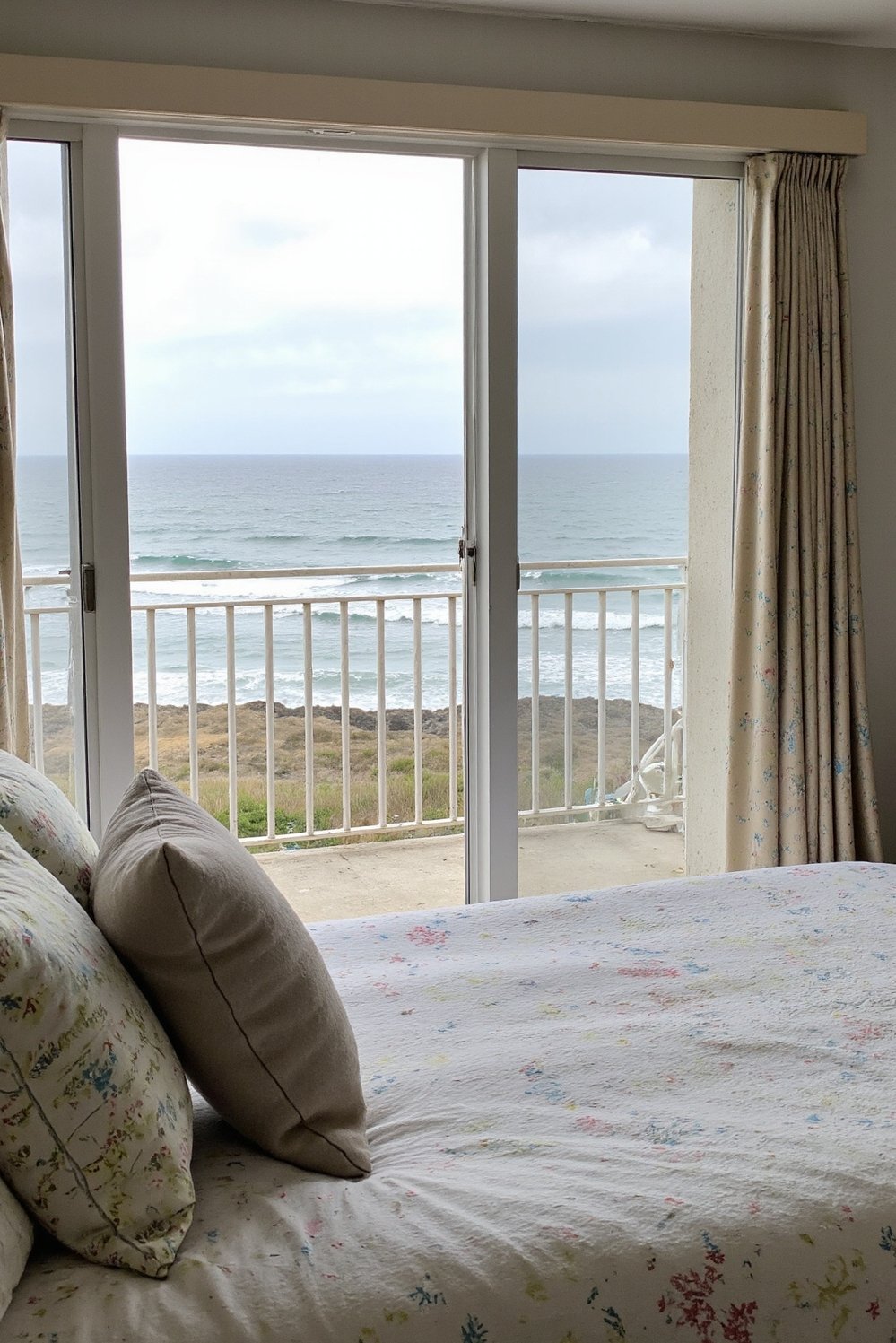 coastal cottage bedroom ideas - Bright Coastal Bedroom with Ocean Views - Ocean view bedroom: wake up to the sound...