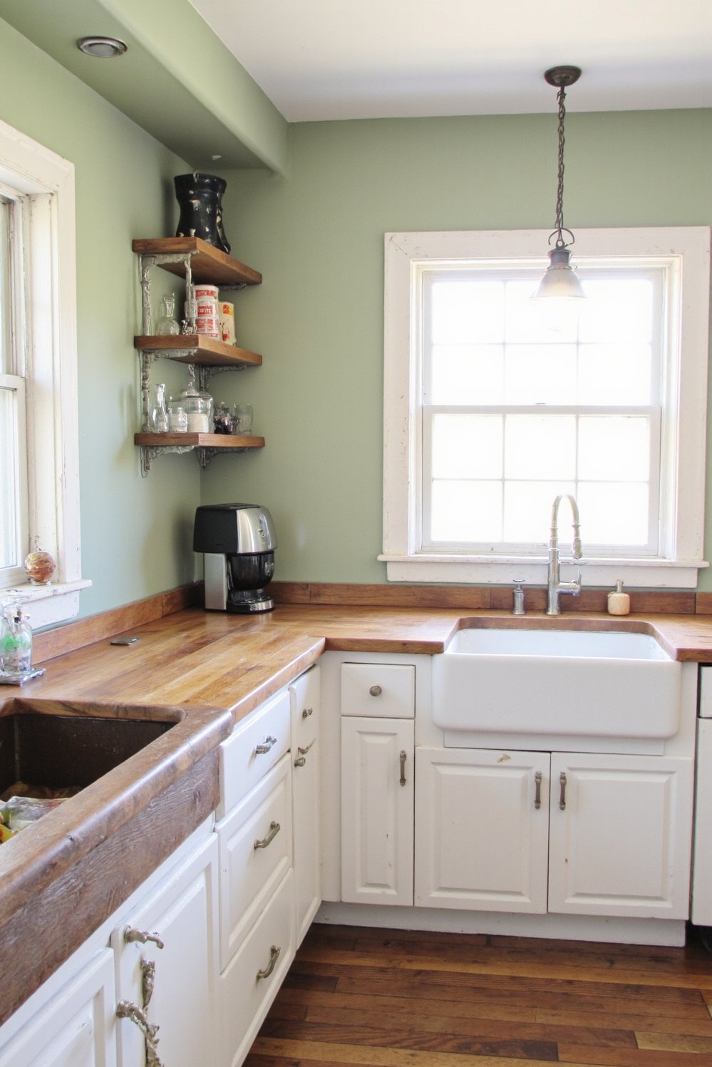 Sage Green Home Decor Ideas - Sage Green Kitchen Walls & White Cabinets - Sage green kitchen walls? This bright kitchen proves...