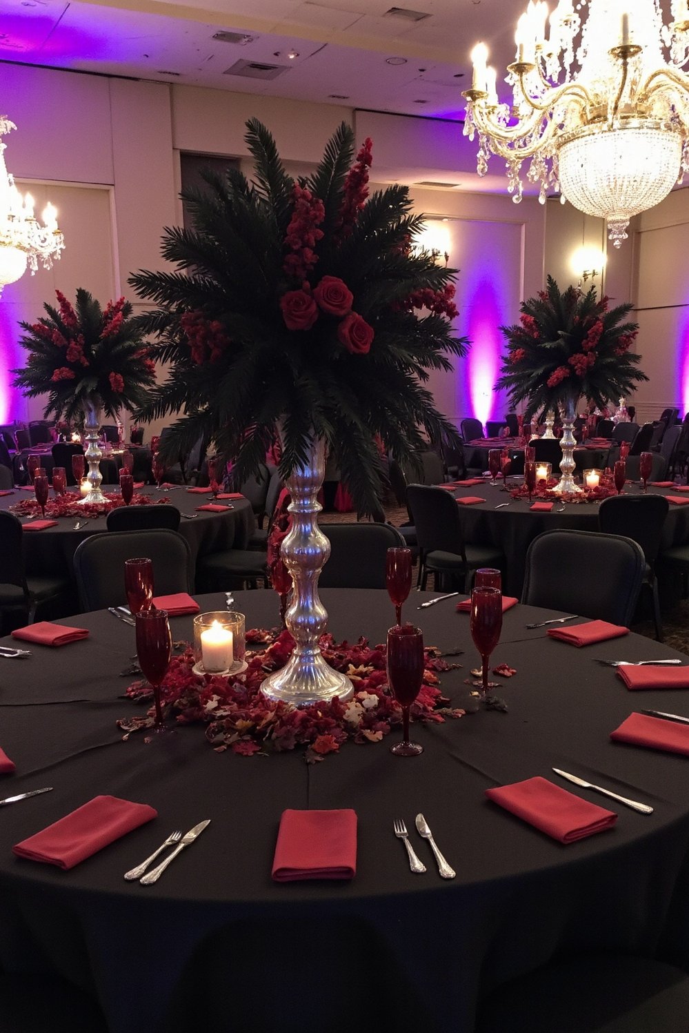Moody Romantic Wedding Decor - Luxurious Dark Wedding Ballroom Decor - Dark wedding reception inspiration: Crystal chandeliers sparkle above...