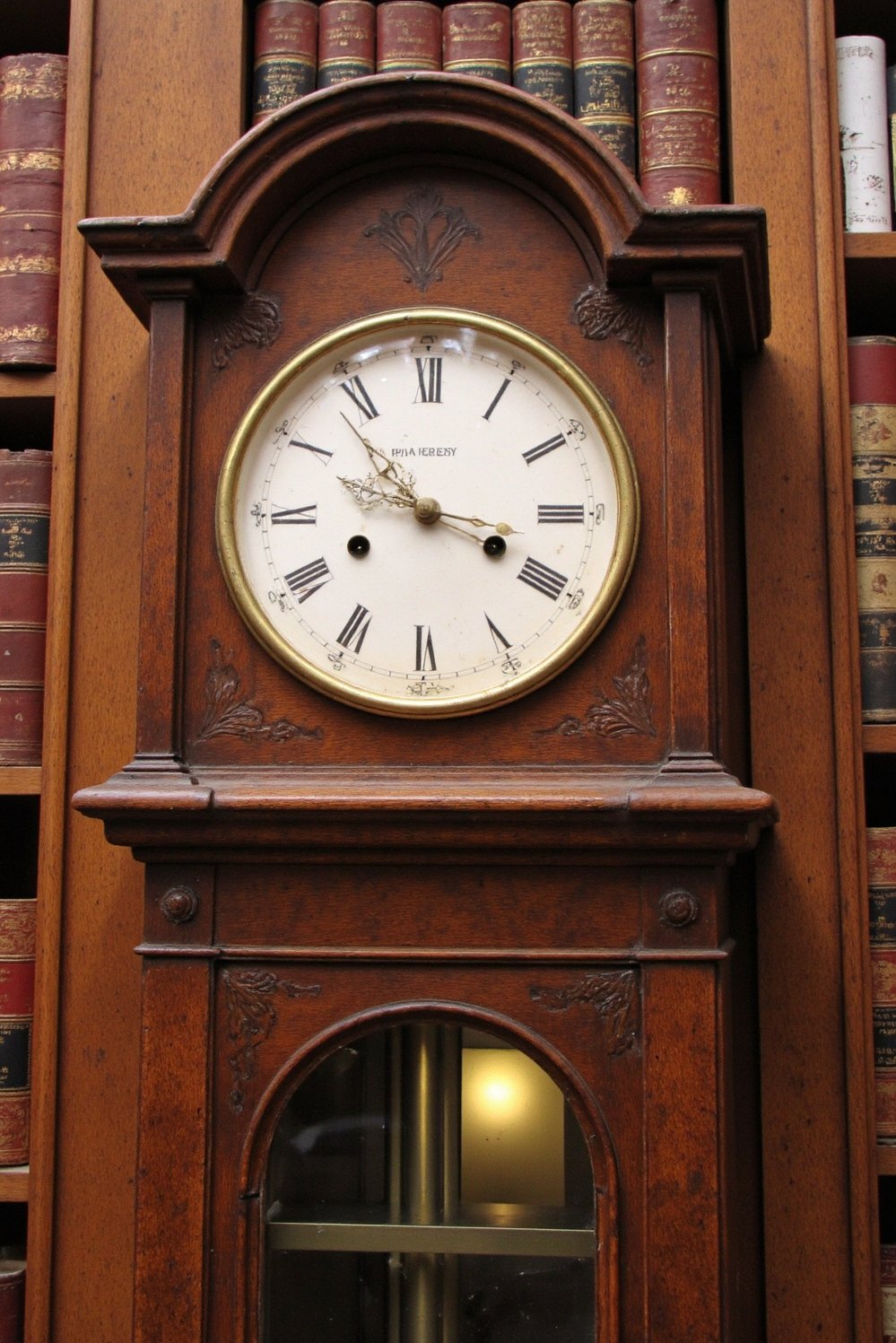 grandfather clock examples - Elegant Grandfather Clock in a Formal Library - This grandfather clock, with its subtly arched top,...