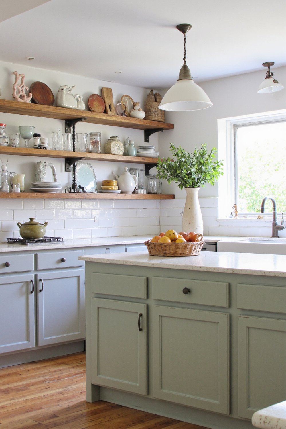 Sage Green Home Decor Ideas - Sage Green Kitchen Island & Grey Cabinets - Sage green kitchen island? Yes, please! This farmhouse...