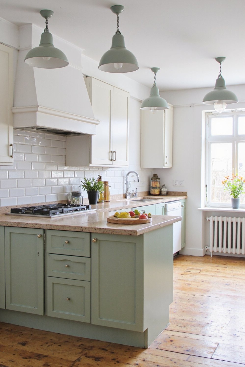 Sage Green Home Decor Ideas - Sage Green Accents in a Scandinavian Kitchen - Sage green kitchen? This Scandinavian-style kitchen is dreamy....