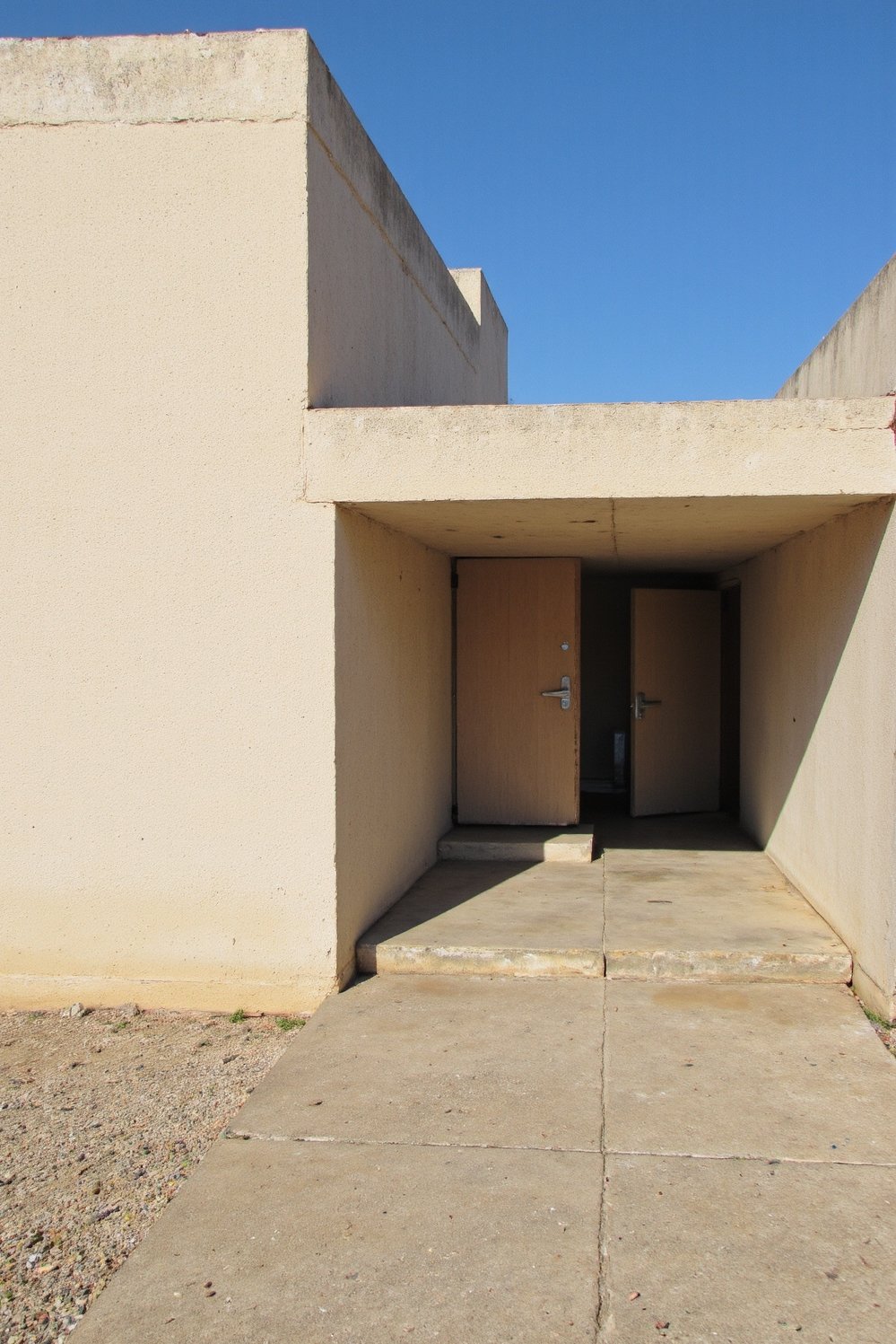 Modern house exteriors - Mysterious Minimalist House: Hidden Entrance Design - Modern house exterior with a hidden entrance. The...