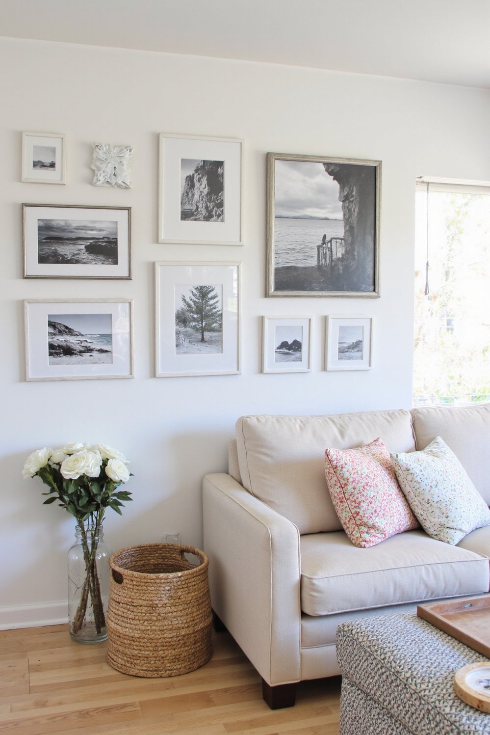 beachy living room ideas - Coastal Gallery Wall Living Room: Neutral & Chic - Modern coastal living room with a stunning gallery...