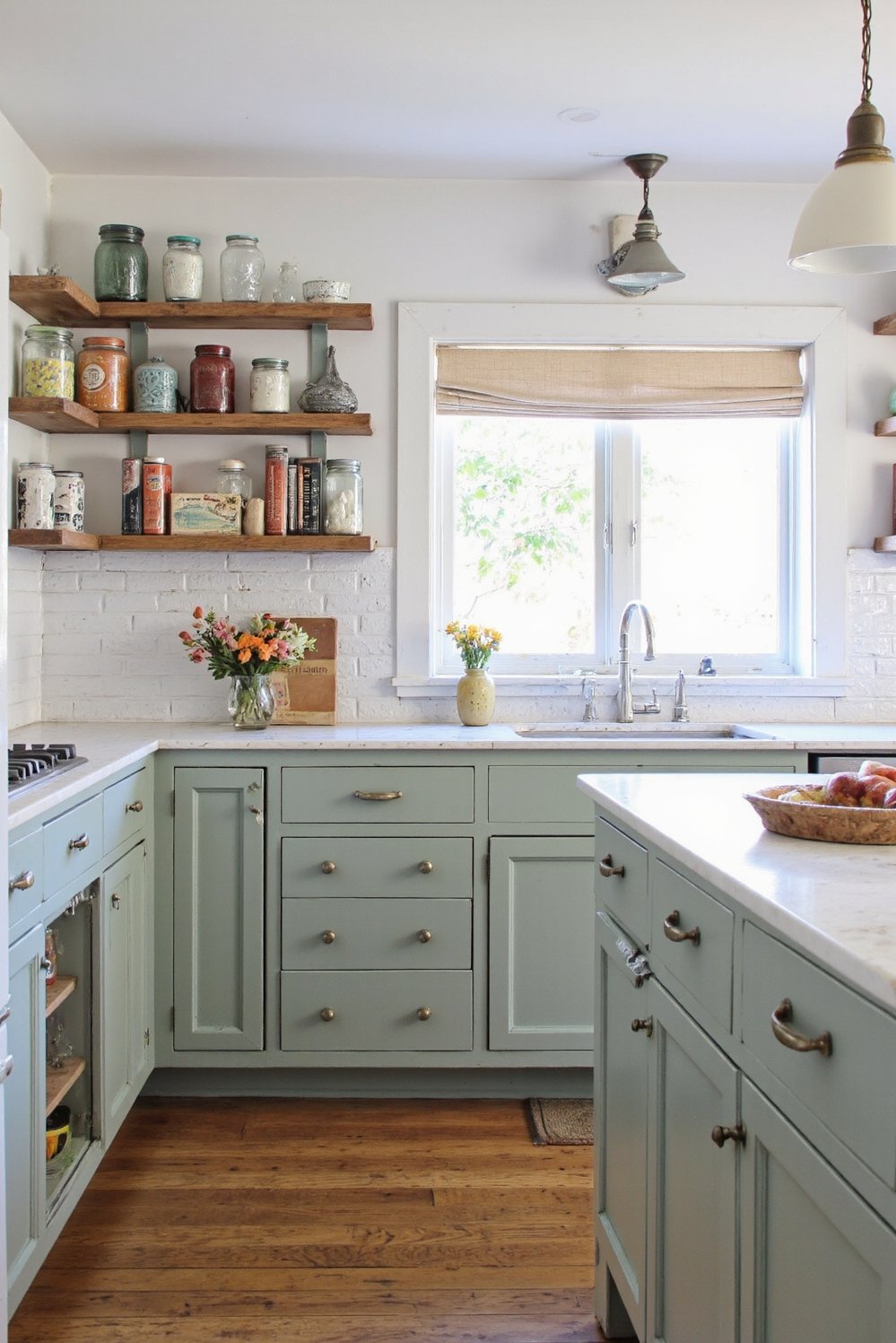 Sage Green Home Decor Ideas - Modern Farmhouse Kitchen: Muted Green Shaker Cabinets - Sage green kitchen cabinets? This modern farmhouse kitchen...