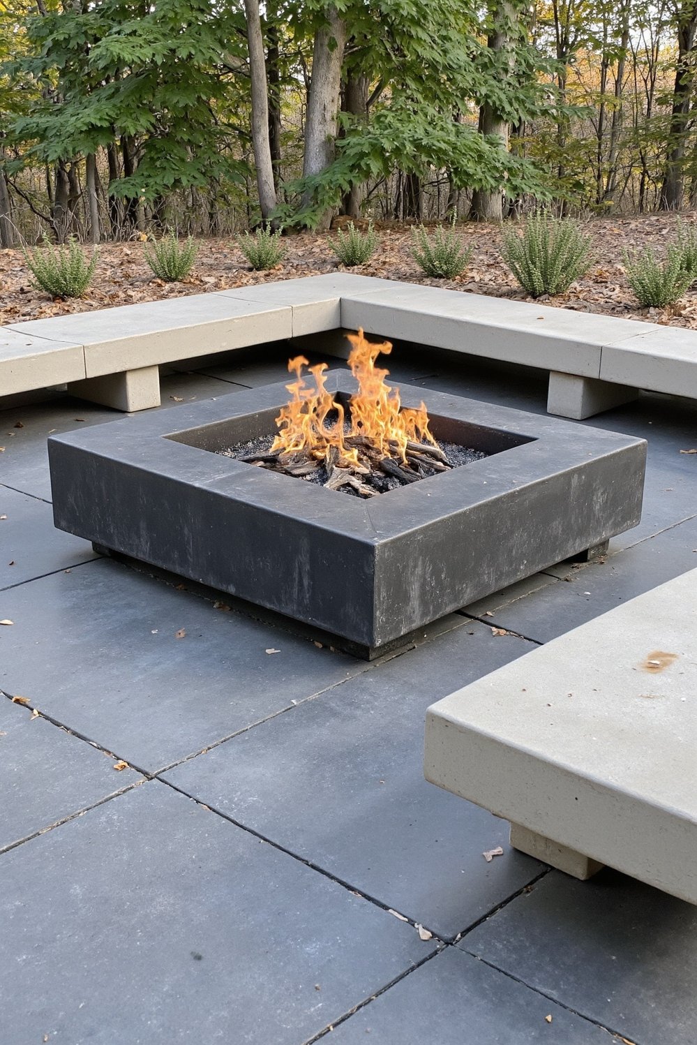 Fire pit patio ideas - Sleek Modern In-Ground Fire Pit with Concrete Patio - Modern minimalist patio ideas featuring a sleek, in-ground...