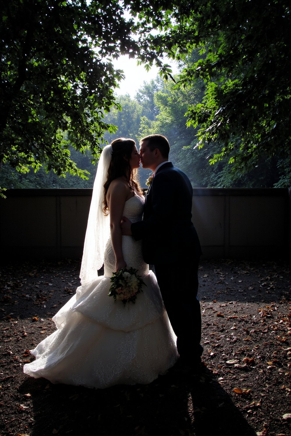 Moody Romantic Wedding Decor - Moody Romantic Wedding Portrait: Dark Leafy Setting - Moody romantic wedding photo: The bride and groom...