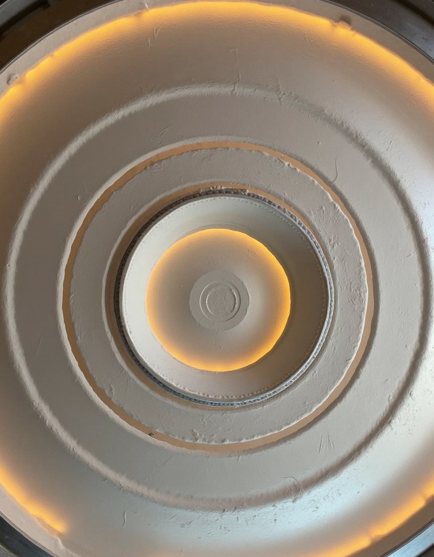 Innovative contemporary ceiling design - Concentric Circle Ceiling Design: Modern Art Gallery - Geometric ceiling design: concentric circles in warm grey....