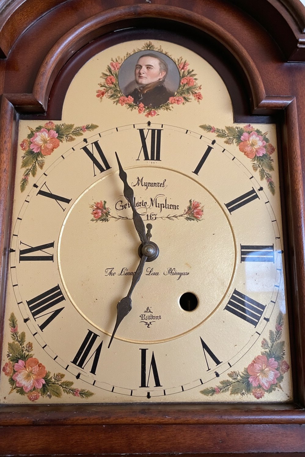 grandfather clock examples - Antique Grandfather Clock: Intricate Roman Numerals - Intricate details of an antique grandfather clock. The...