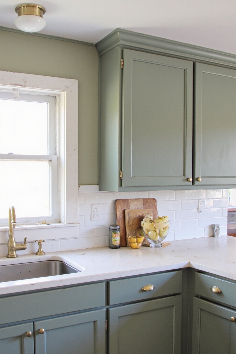 Sage Green Home Decor Ideas - Muted Green Shaker Cabinets: Timeless Kitchen Design - Classic shaker cabinets in a muted sage green...