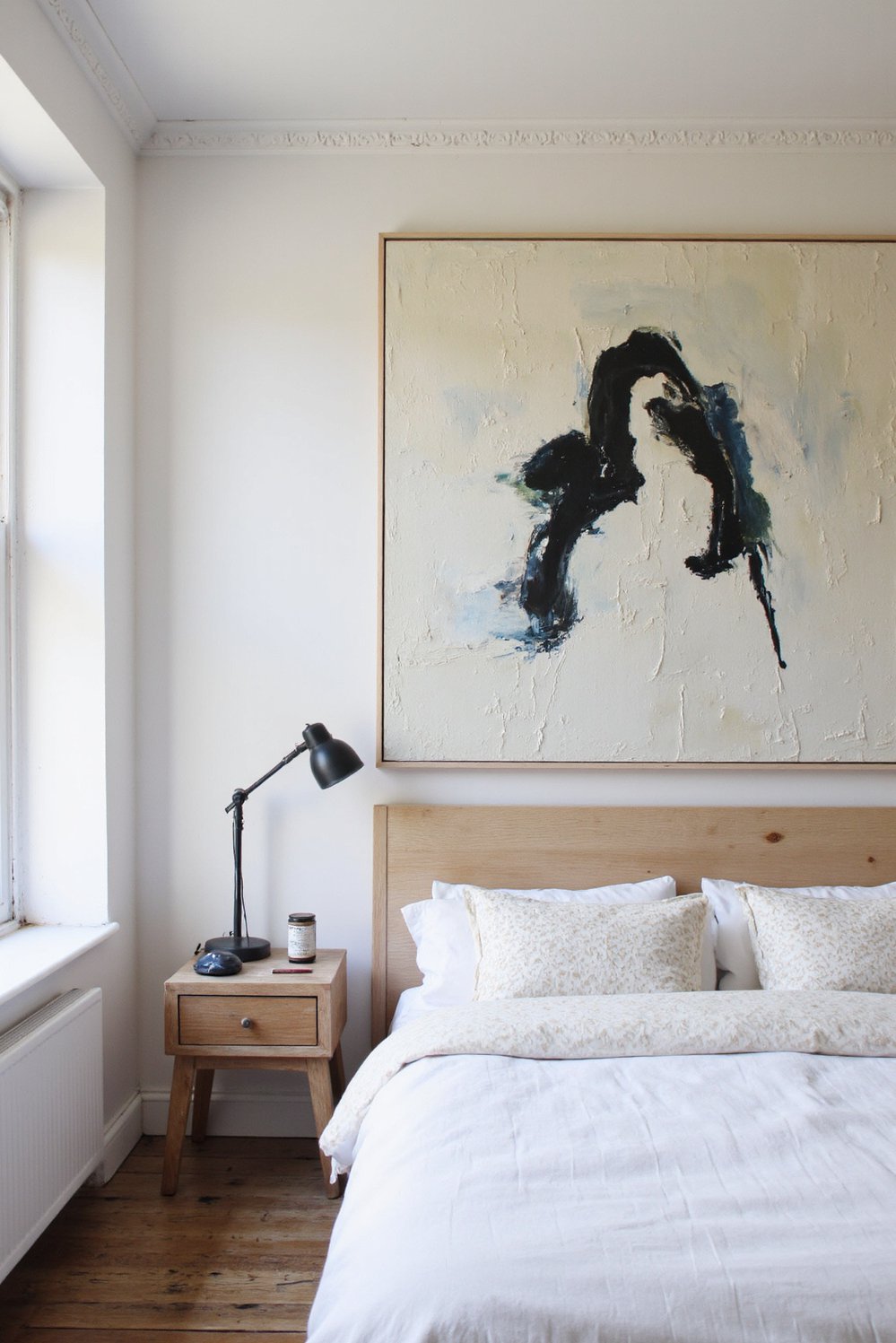 Scandinavian bedroom ideas - Cozy Scandinavian Bedroom with Statement Art - This cozy Scandinavian bedroom is all about creating...