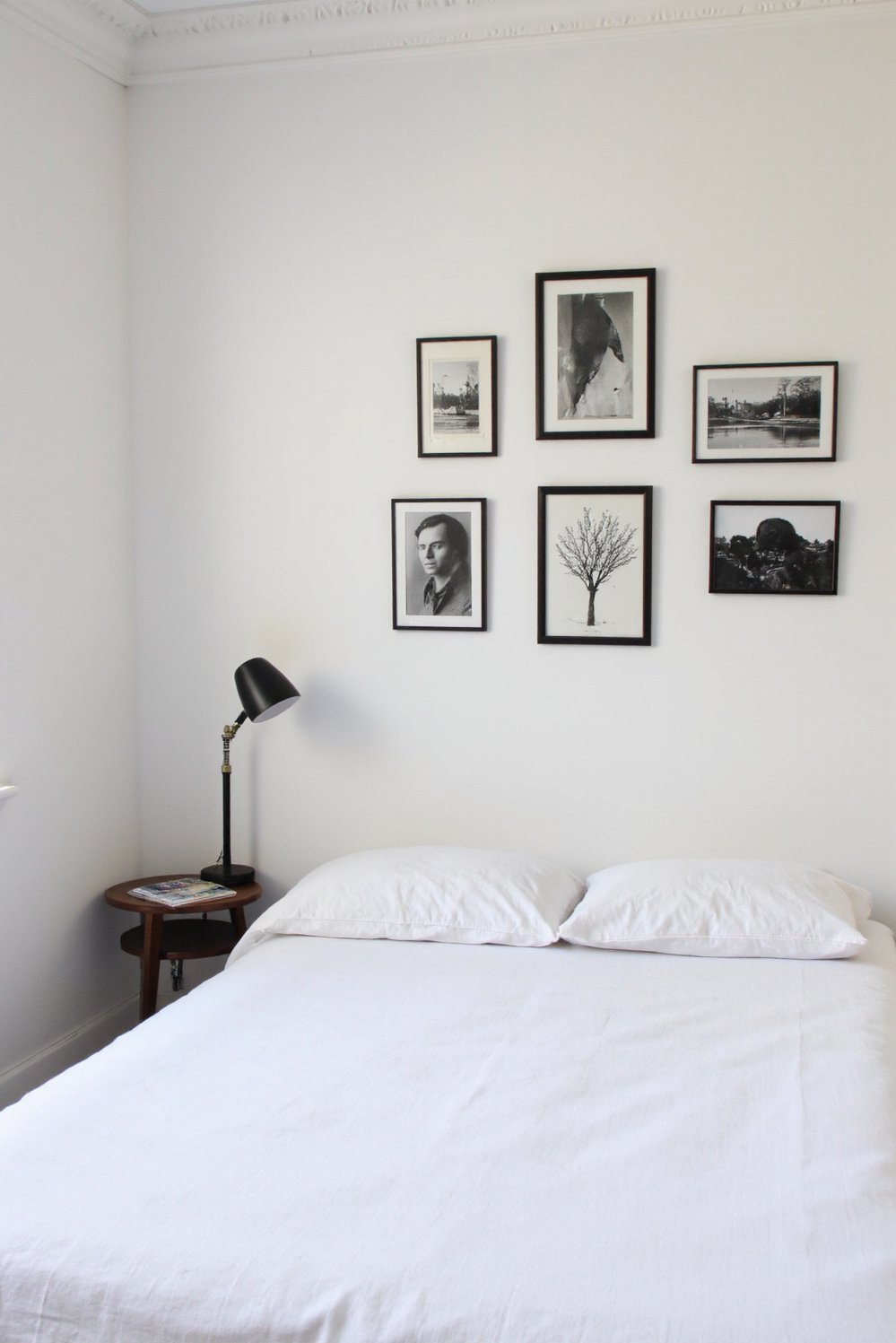 Tips for minimalist bedroom decoration - Minimalist Decor: Black & White Gallery Wall - Achieve a minimalist bedroom aesthetic with a stylish...