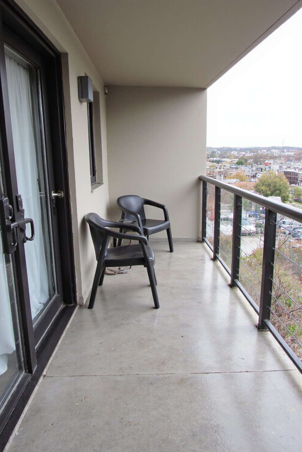 Balcony flooring ideas - Polished Concrete Balcony Floor: Modern Industrial Design - Give your balcony a sleek, industrial-chic vibe with...