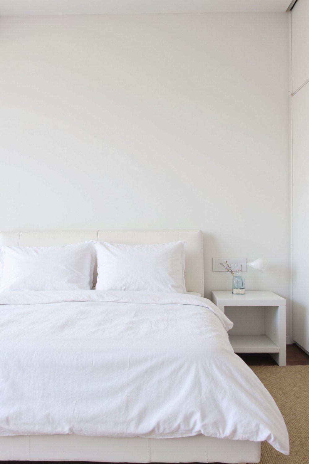 White bedroom decor ideas - Sleek Minimalist White Bedroom Design - Modern white bedroom design. A sleek platform bed...