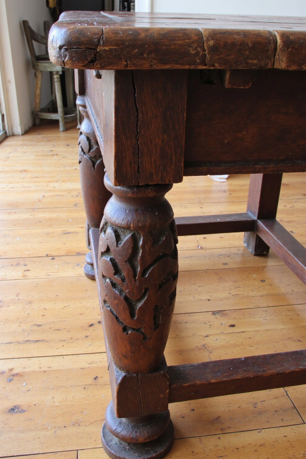 Wood kitchen island ideas - Mahogany Rustic Kitchen Island: Intricate Carved Legs - This rustic kitchen island is a showstopper. The...