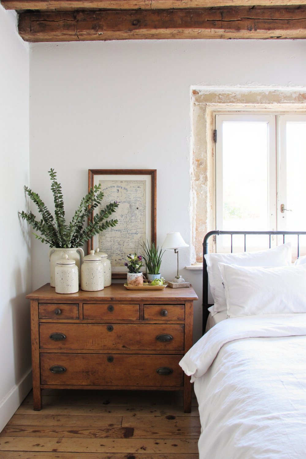 Scandinavian bedroom ideas - Rustic-Chic Scandinavian Bedroom with Wooden Beams - Rustic Scandinavian bedroom: Exposed wooden beams add warmth...