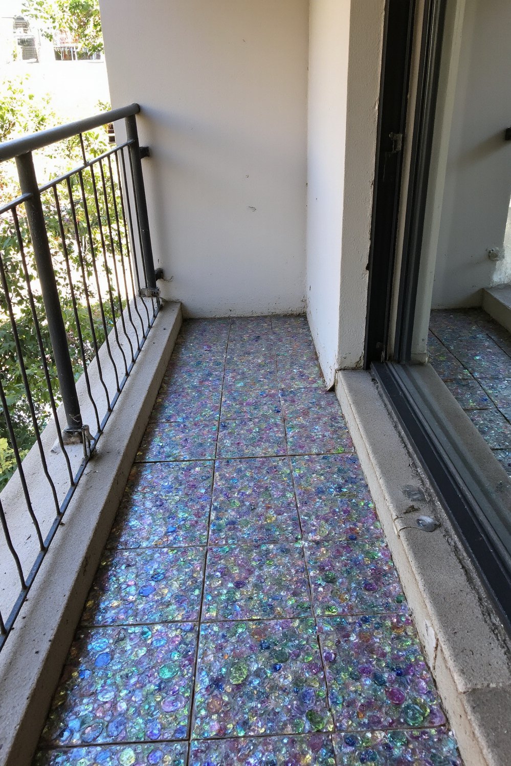 Balcony flooring ideas - Shimmering Glass Tiles: Small Balcony Design Ideas - Shine up your small balcony with recycled glass...