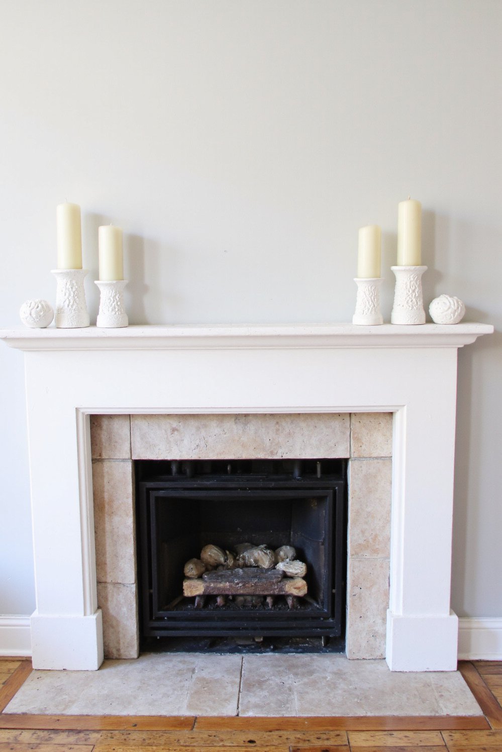 White bedroom decor ideas - Cozy White Bedroom with Fireplace Focal Point - Create a cozy white bedroom with a fireplace...