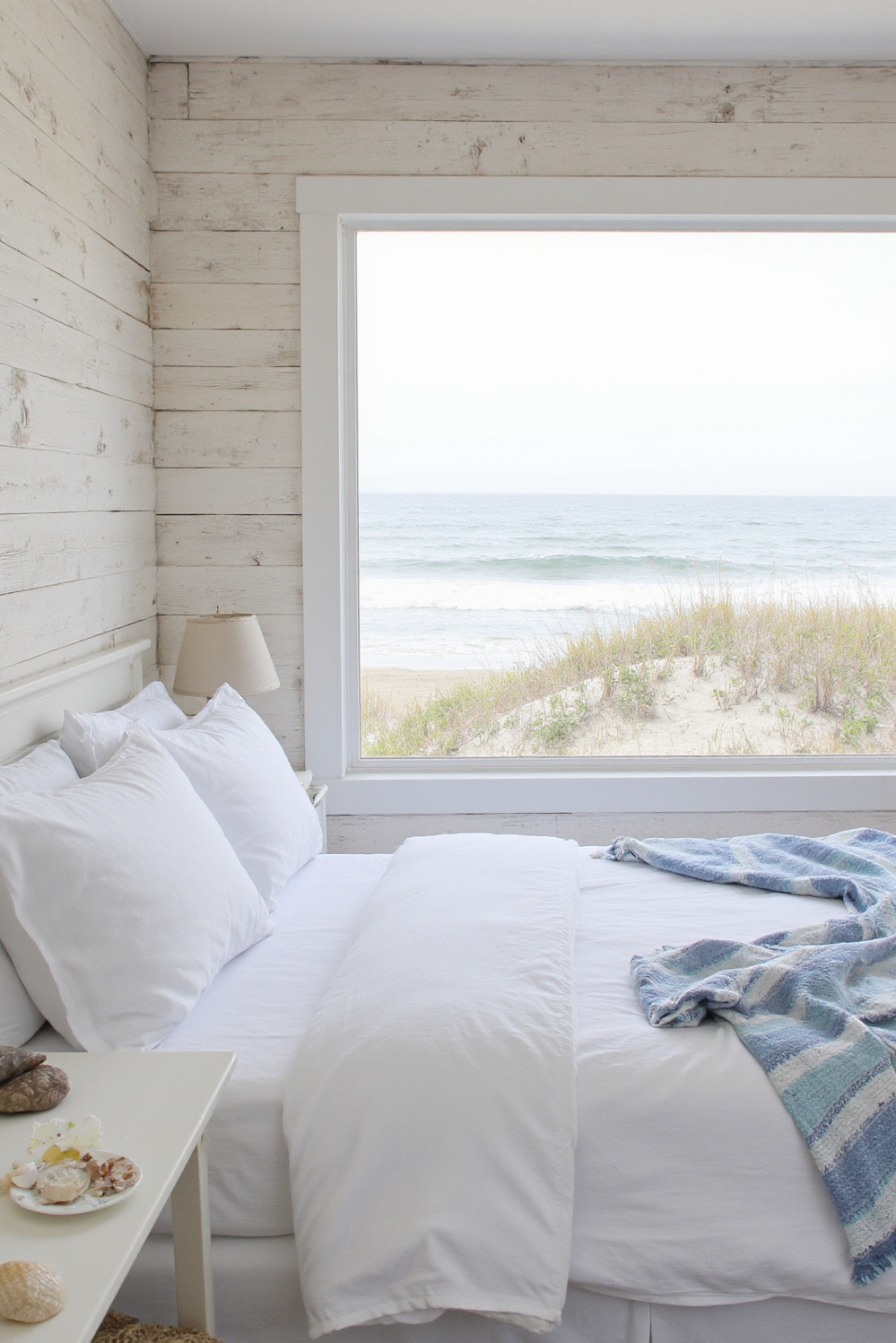 Cozy room aesthetic - Cozy Coastal Bedroom Retreat - Sunlight streams into this coastal retreat bedroom, immediately...