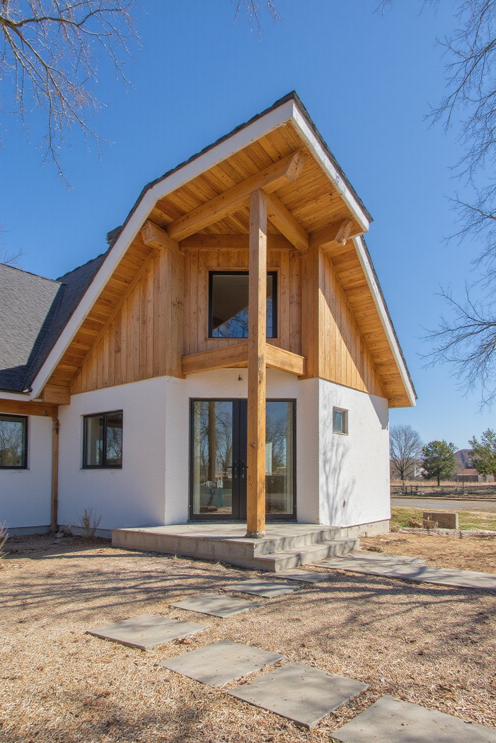 modern barn house - Cool Comfort: Modern Barn Living - Sunlight dances across the facade of this modern...