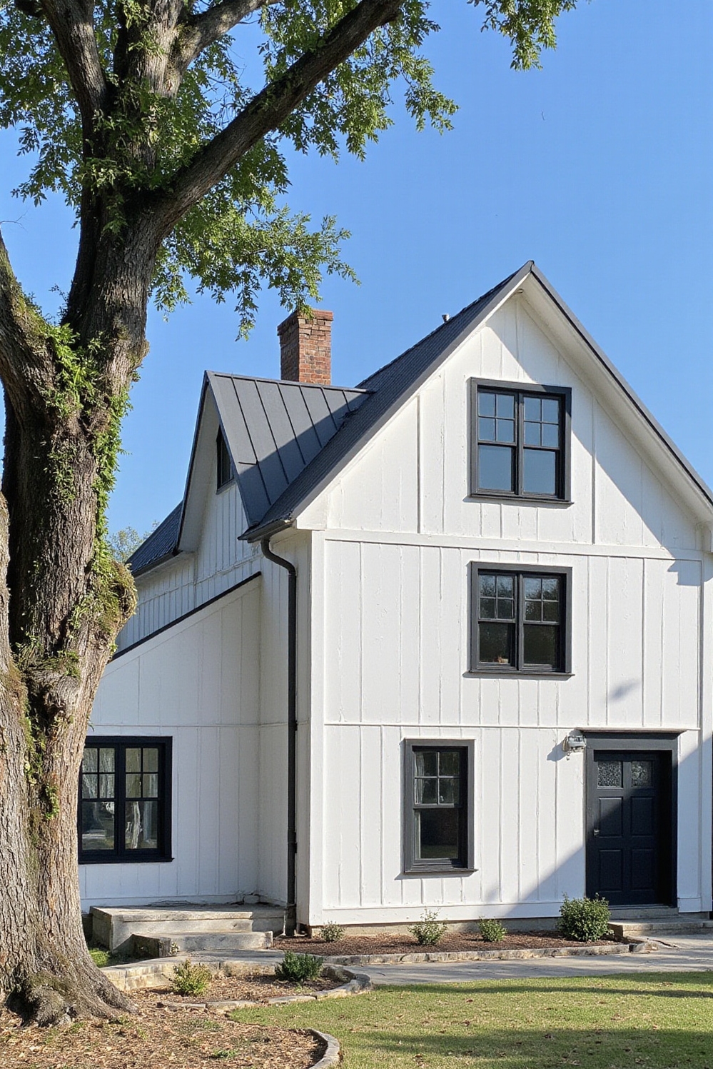 modern barn house - White Barn House Perfection - Sunlight bathes this modern barn house, highlighting the...