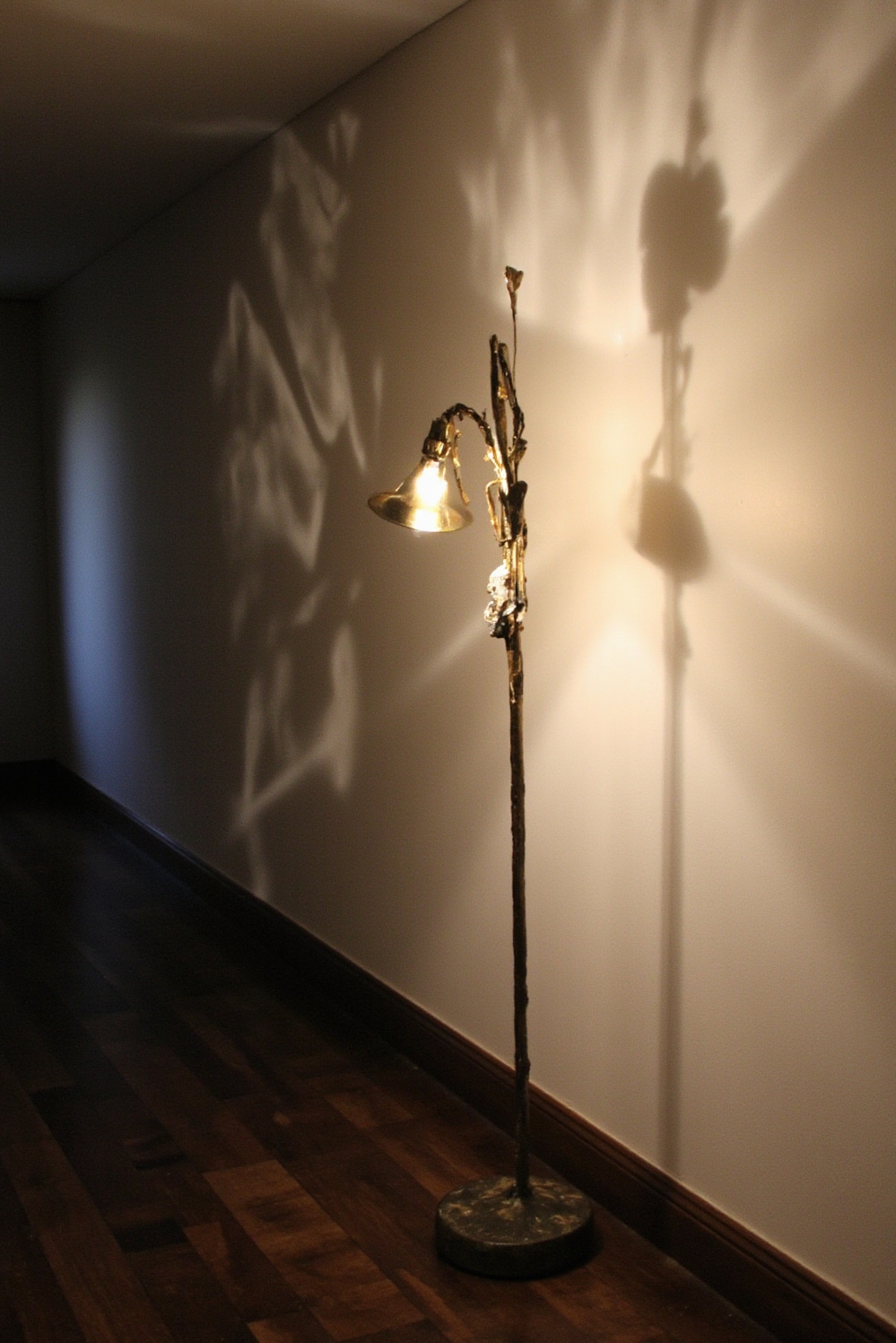 end of hallway decor - Dramatic Light Shapes Hallway's End - A minimalist hallway terminates in a captivating display...