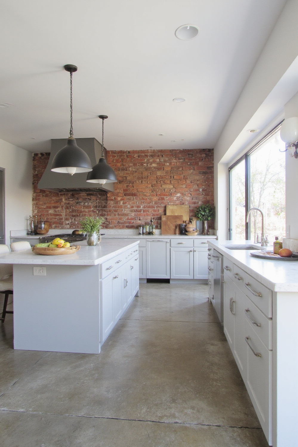 Industrial kitchen design - Elegant Industrial Accents - Step into a kitchen where modern elegance meets...