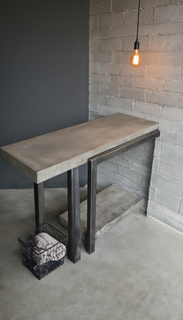 Hallway table ideas - Hallway Tables: Industrial Edge Defined - Raw steel I-beams boldly support a thick slab...