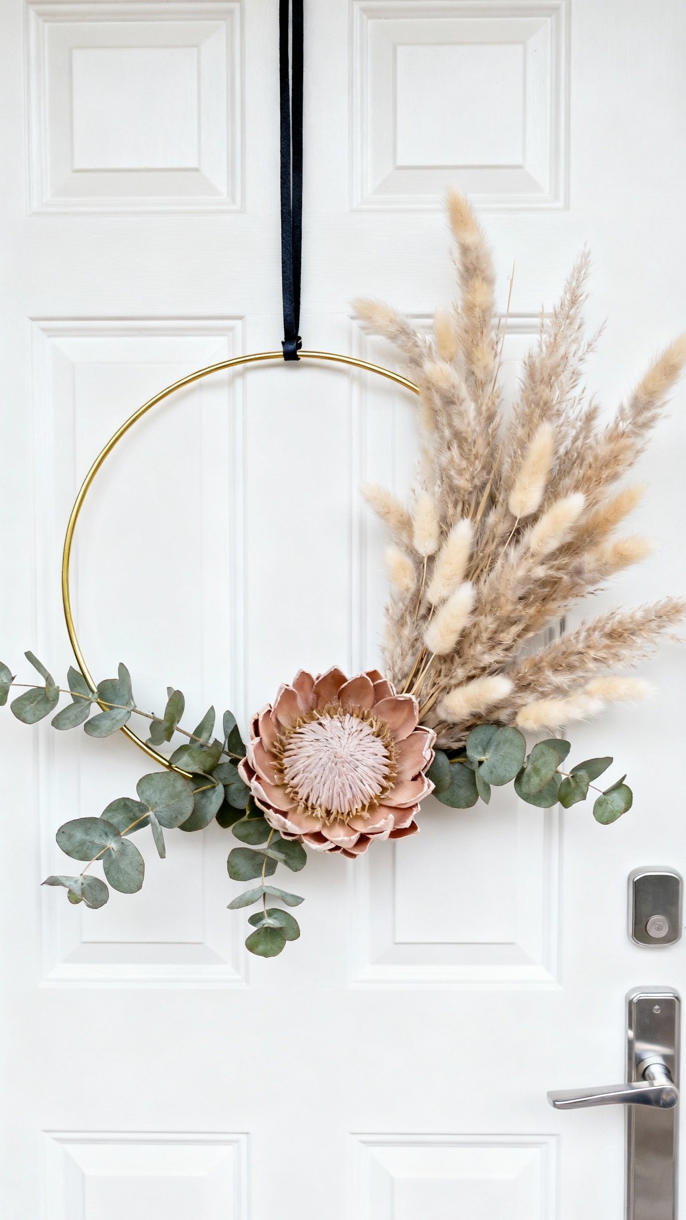 fall wreaths - Modern Fall Wreaths: Simple Elegance - A sleek white front door welcomes guests with...
